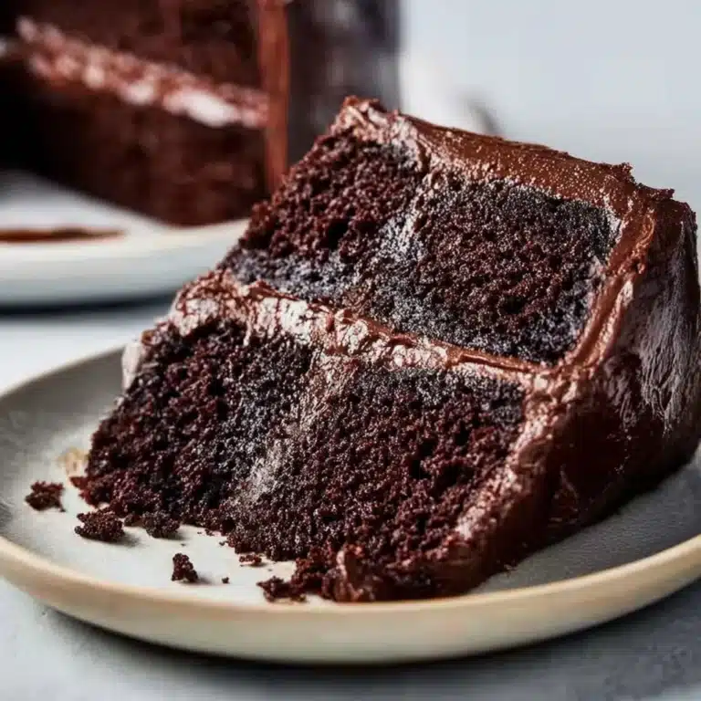 Rich and moist chocolate cake recipe with creamy frosting Recipe
